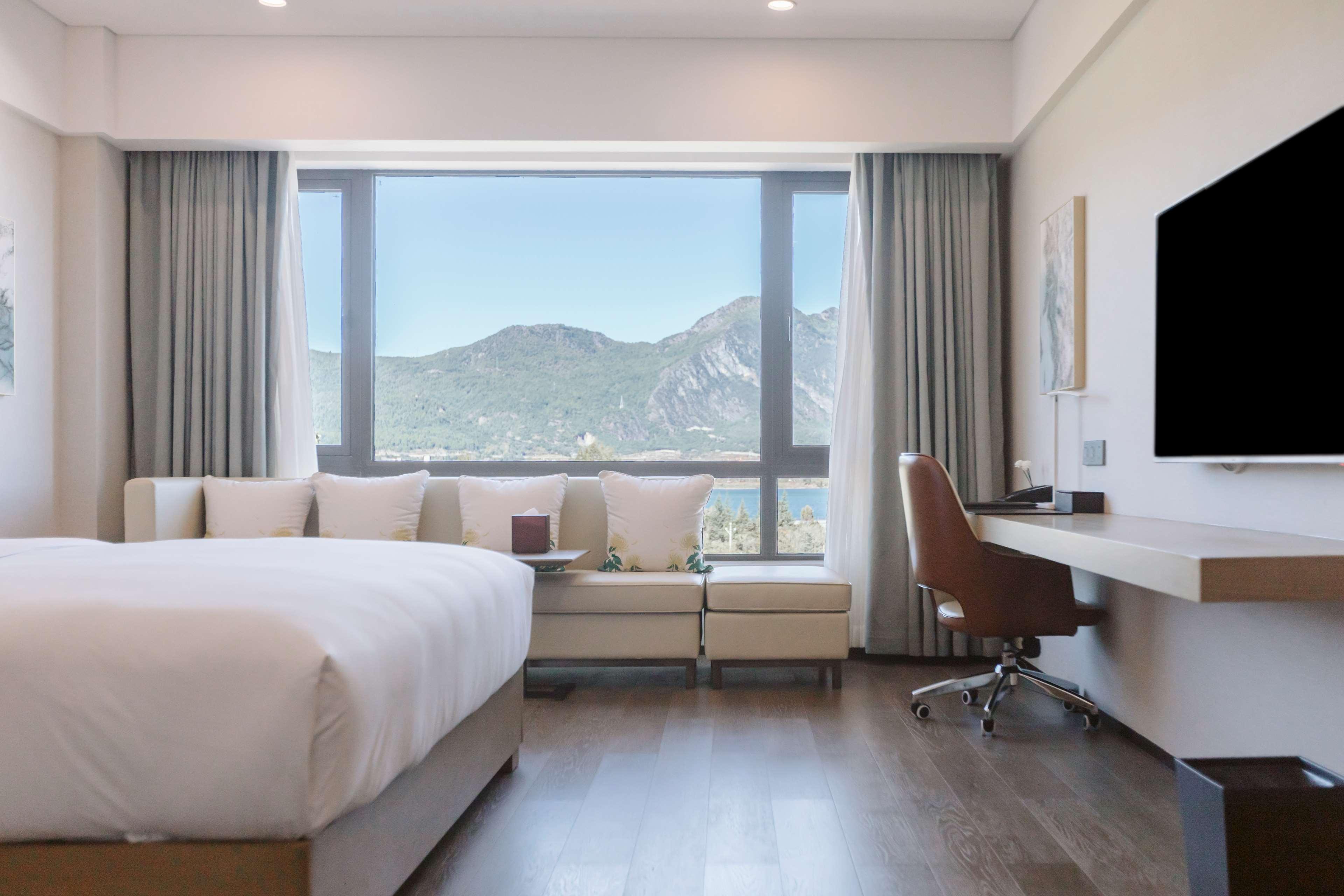 Отель Hilton Lijiang Лицзян Экстерьер фото